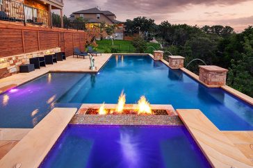 inground pool with fire pit